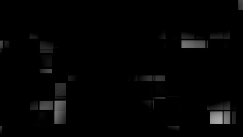 This video showcases a dynamic display of illuminated mosaic tiles forming an abstract digital pattern on a black background with varying brightness levels creating depth and visual interest.