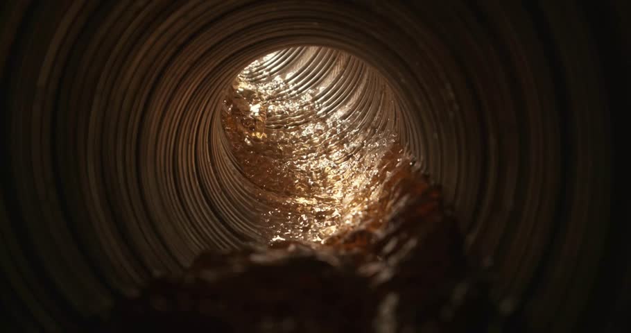 Close-Up Inner View of Water Flowing Through a Tube with Splashes and Flushing Effect – Real-Time Wet Interior Motion Footage