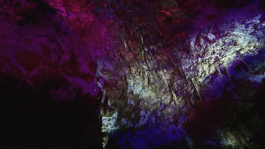 Lights changing color in the Prometheus Cave near Kutaisi, Georgia