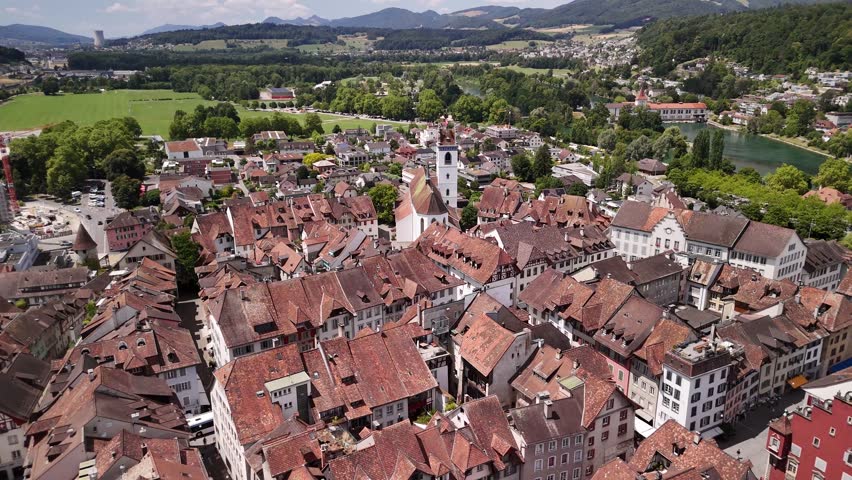Clock tower old town square Aarau city Switzerland drone aerial Swiss Aargau canton