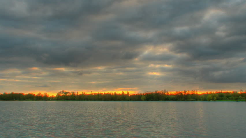 Sunset over lake, HD time lapse clip, high dynamic range imaging