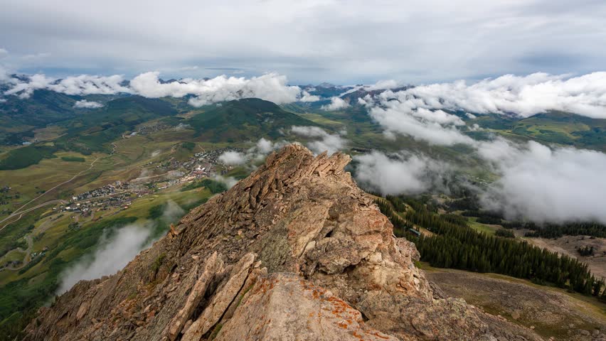 Timelapse Of Clouds Moving Above Mountains Landscape and Crested Butte, Colorado USA