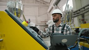 Window factory worker operating machinery with laptop - Powered by Shutterstock - Get 15% off with code: PIKWIZARD15