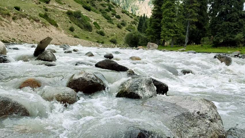 Beautiful high mountain turbulent river close up, my travel