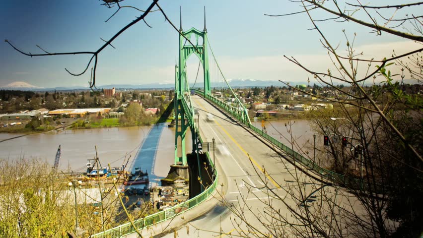 View of the st johns bridge in portland oregon on a sunny day with blue sky