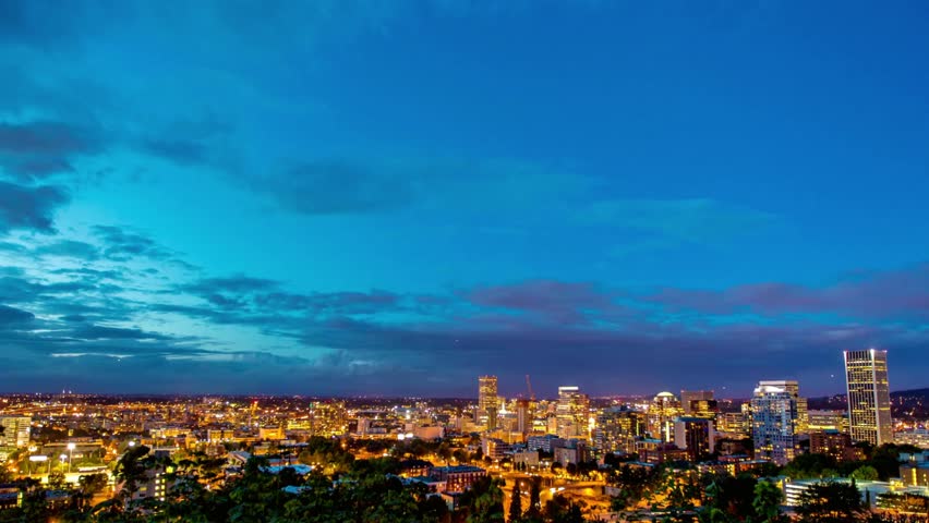 Beautiful skyline of portland, oregon at night with city lights and dark sky