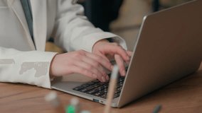 Caucasian businesswoman girl female happy employer in office business woman typing laptop keyboard greeting hello talking communicating with video call online chat HR manager working talk interview - Powered by Shutterstock - Get 15% off with code: PIKWIZARD15