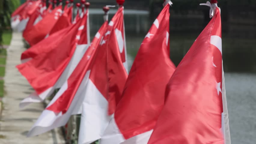 Singapore street decorated with flags for the city anniversary celebration