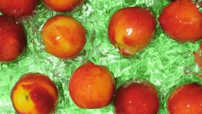 Top View of Ripe Peaches Floating in Water with Ripples Slow Motion - Powered by Shutterstock - Get 15% off with code: PIKWIZARD15