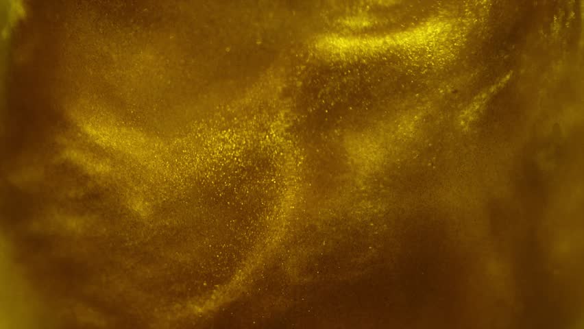 Gold particles floating background, Liquid gold, golden abstract backdrop. Beautiful metallic yellow texture, swirls moving. Metallic paint close-up. Art Wallpaper waves surface.  