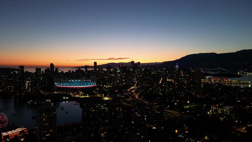 Sunset over Vancouver skyline in summer drone aerial