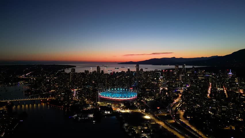 Sunset over Vancouver skyline in summer drone aerial