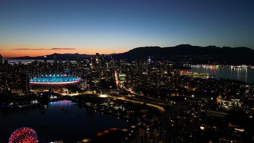 Sunset over Vancouver skyline in summer drone aerial