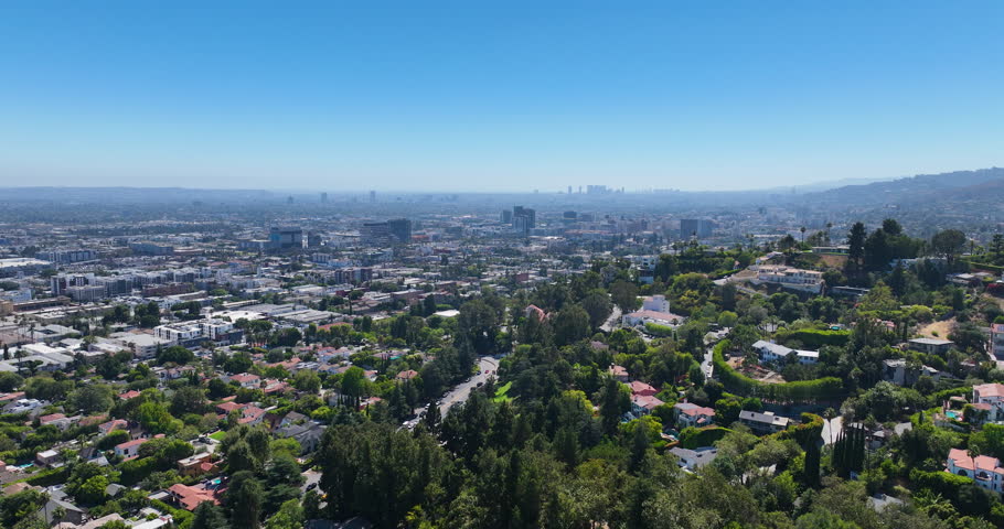 Hollywood Hills, Los Angeles, California, USA, July 31, 2025, Aerial shot on a sunny day in the Hollywood Hills over a neighborhood.