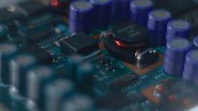 The white line scanning the printed circuit board with electronic components. Closeup. Macro. Shallow depth of field - Powered by Shutterstock - Get 15% off with code: PIKWIZARD15