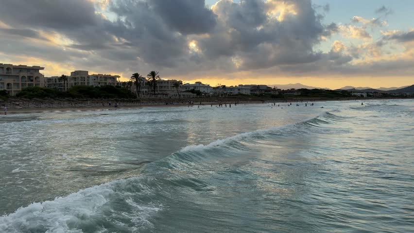 Colorful sunset at Alcudia beach, Mallorca, Spain