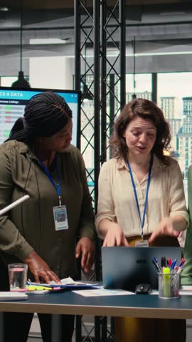 Vertical Video Powerful team of professional women meets in the boardroom to align goals and discuss insights of a multinational company, driving success through collaborative development and strategy