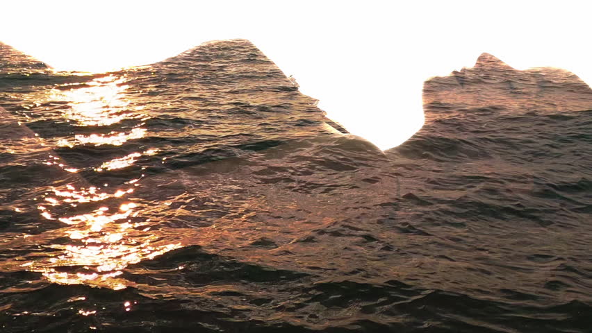 Vertical video. Water silhouette. Nature energy. Inner peace. Double exposure sunset sea waves in relaxed woman profile outline isolated on white.