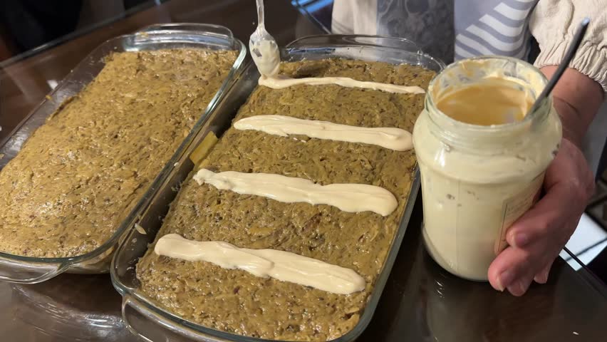 Persian food balsamic garnish topping healthy eggplant dip Kashke Bademjan wine roasted garlic handmade traditional dish family buffet indoor feast dining table relatives Iranian party vegan cuisine