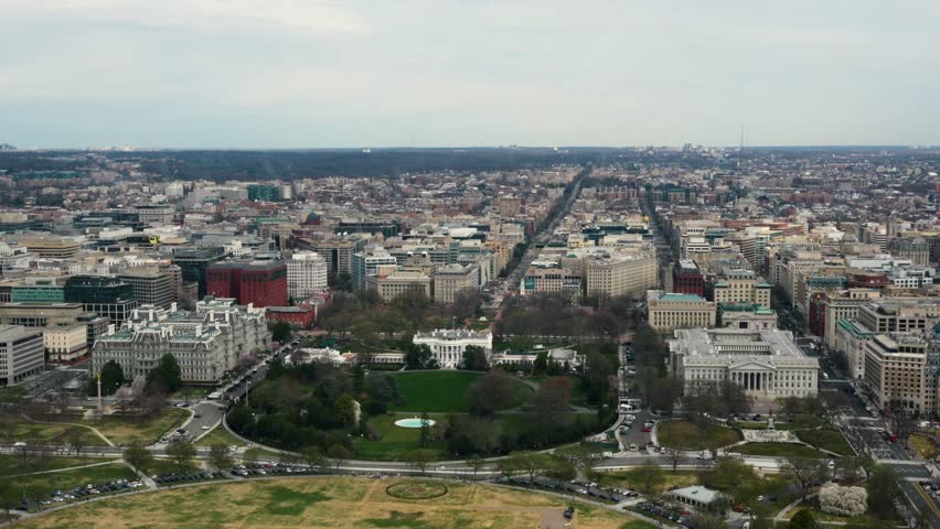High angle static wide view of the White House and Washington DC city
