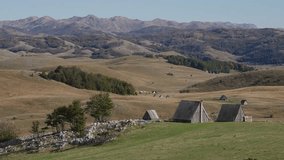 Scenic view of Durmitor National Park, Montenegro, with rustic cabins - Powered by Shutterstock - Get 15% off with code: PIKWIZARD15