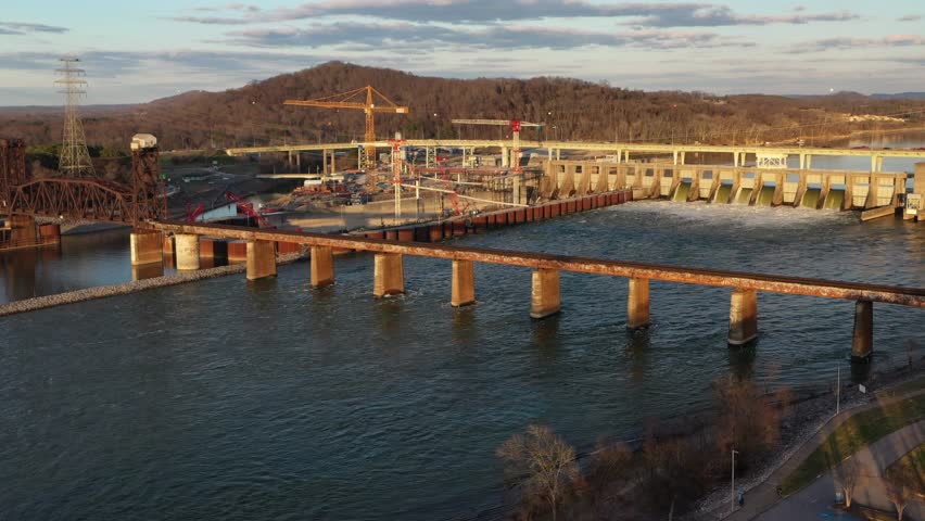 Stunning 4K drone footage of Chickamauga Dam, showcasing its structure, the Tennessee River, and scenic beauty. Perfect for infrastructure, travel, or history projects.