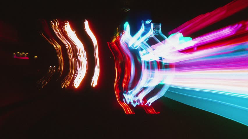 night traffic in the city, urban blurred motion lights at night with long exposure and stop motion style, chaotic movement with urban long exposure lights, urban fast motion point of view