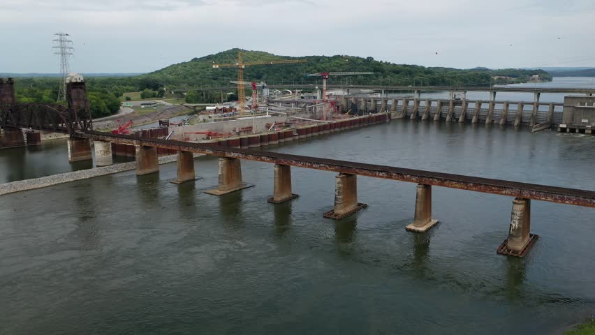 Stunning 4K drone footage of Chickamauga Dam, showcasing its structure, the Tennessee River, and scenic beauty. Perfect for infrastructure, travel, or history projects.