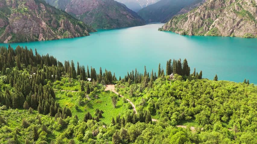 aerial footage of Sary-Chelek Lake, Kyrgyzstan. UNESCO Biosphere Reserve is a pristine natural wonder in Central Asia