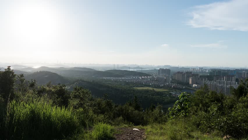 Urban outdoor mountaintop scenery with cloud delay