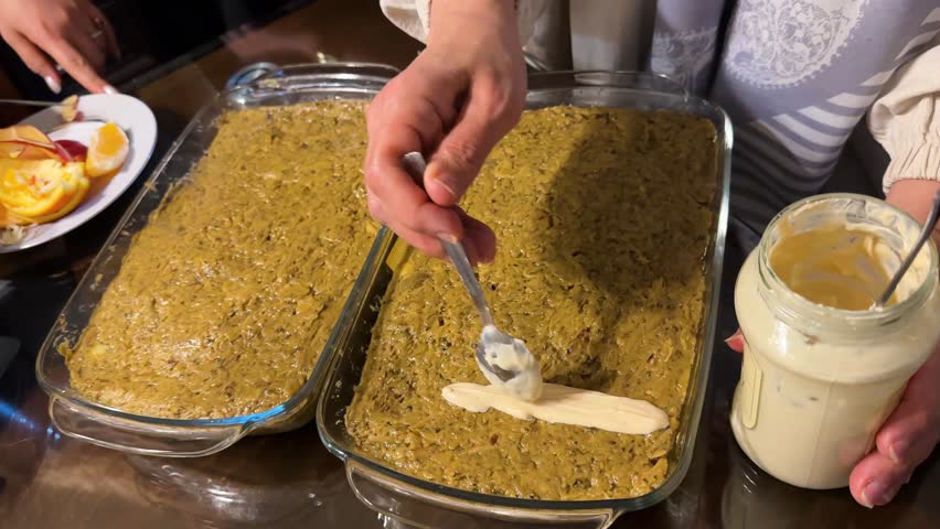 Kashke bademjan creamy eggplant curd dip highlights of Persian party buffet Roasted garlic tangy whey and traditional flavors Served alongside sosis bandari adas polo and homemade wine sandwich cake