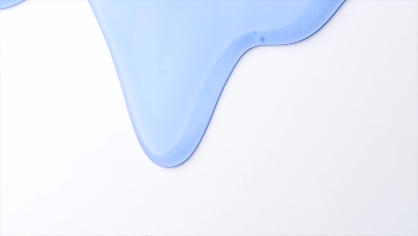 Blue liquid gel flowing, washing, shower fluid gel border, on white background, dripping shampoo texture on white, body care cosmetic, texture of liquid gel, soap backdrop, top view. Slow motion 