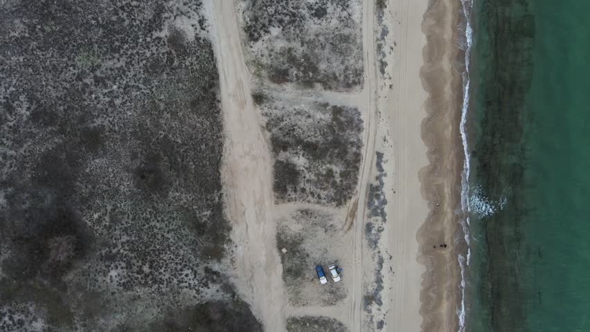Aerial top down of wrecked boat Mediterranean Sea view from shipwreck near Thessaloniki Greece