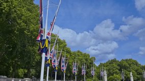 Static view a row of Union Jack British flags. - Powered by Shutterstock - Get 15% off with code: PIKWIZARD15