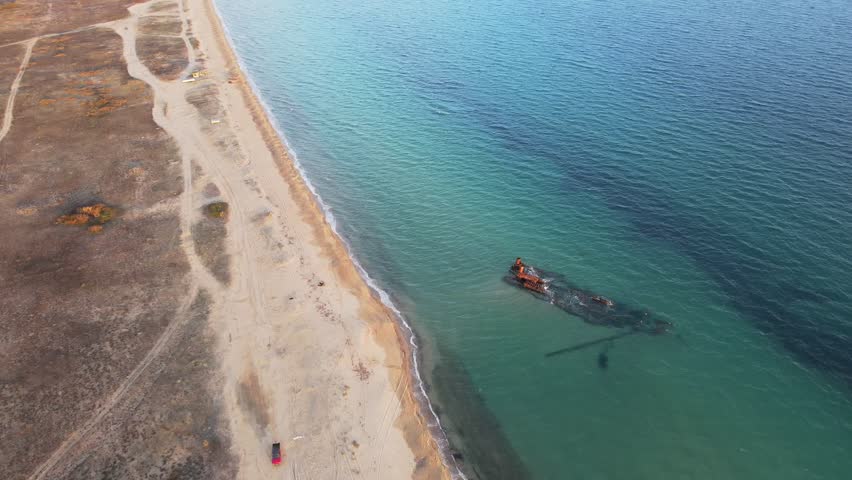 Aerial landscape of wrecked boat Mediterranean Sea view from shipwreck near Thessaloniki Greece