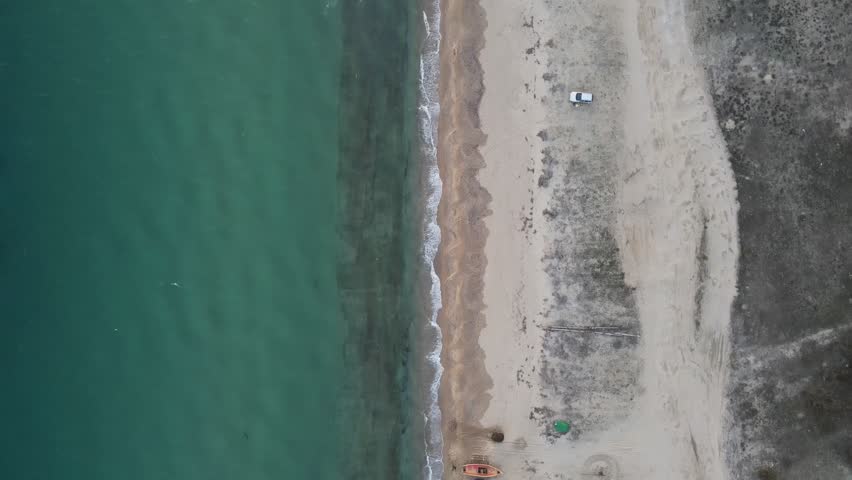 Aerial top down of wrecked boat Mediterranean Sea view from shipwreck near Thessaloniki Greece