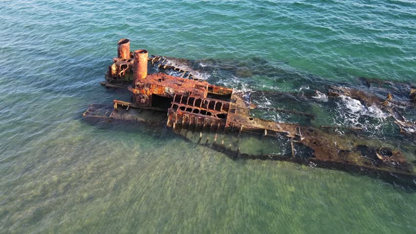 Aerial landscape of wrecked boat Mediterranean Sea view from shipwreck near Thessaloniki Greece