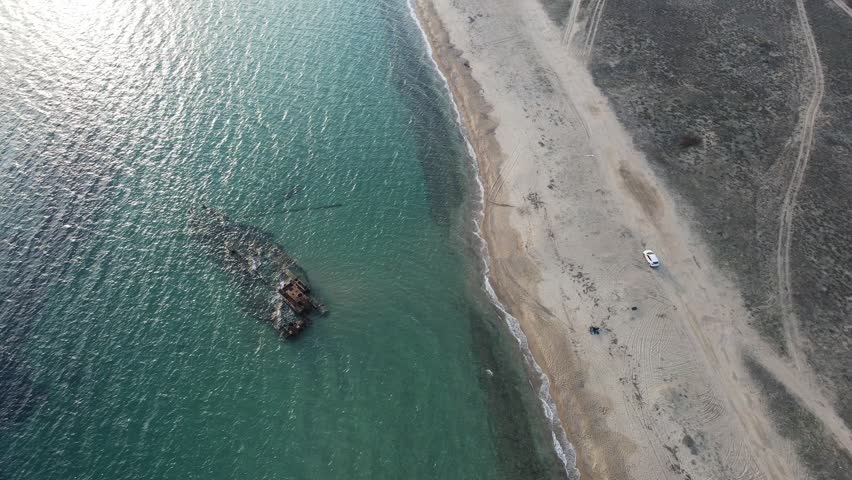 Aerial landscape of wrecked boat Mediterranean Sea view from shipwreck near Thessaloniki Greece