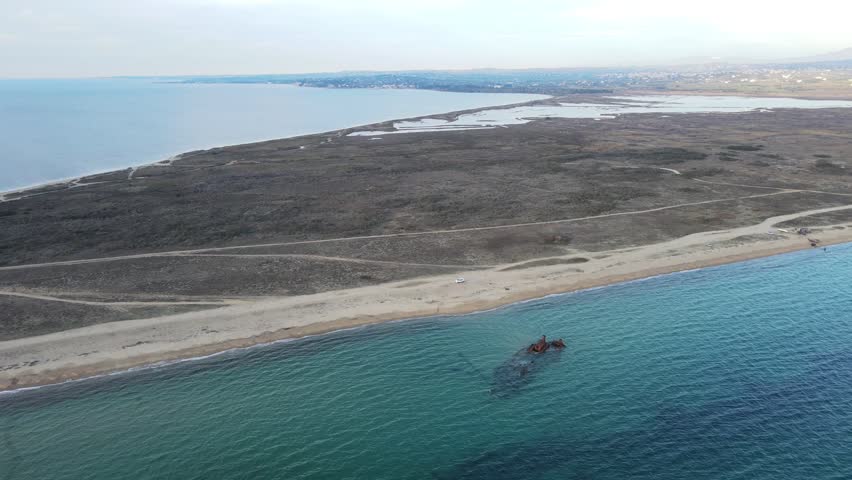 Aerial landscape of wrecked boat Mediterranean Sea view from shipwreck near Thessaloniki Greece