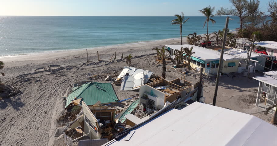 Hurricane Milton storm surge severe damage to waterfront house on Manasota Key, Florida. Destroyed home on gulf coast.