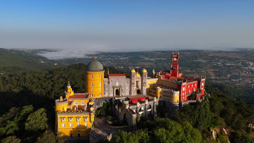 Pena Palace in Sintra, near Lisbon, Portugal, Europe.
Aerial shot of Sintra National Park and its fairytale villas.