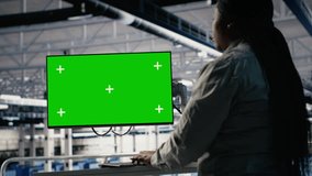 Server room female programmer using green screen computer to scan infrastructure for issues. Data center worker uses mockup PC to organize file backups and plan recovery steps, camera B - Powered by Shutterstock - Get 15% off with code: PIKWIZARD15