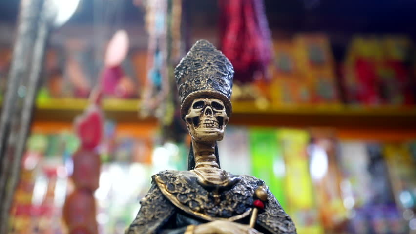 Curious skeleton like statue at La Paz Witches' Market , Aymara traditions