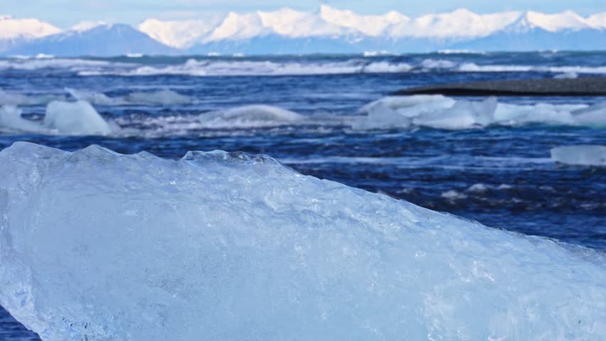 Iceland’s Diamond Beach: Icebergs, Birds and Mountain Backdrop