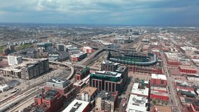 Downtown Denver Coors field Colorado Rockies Baseball Market Street Union Station summer spring rooftop tall buildings aerial drone sunny afternoon blue skies stormy clouds cityscape street forward - Powered by Shutterstock - Get 15% off with code: PIKWIZARD15