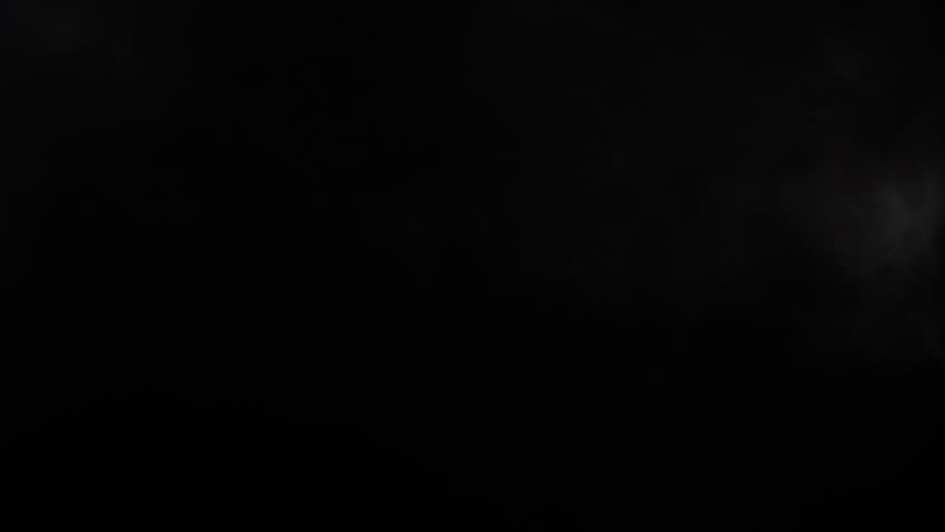 Dense vape smoke cloud being exhaled and expanding in the air over a dark backdrop.