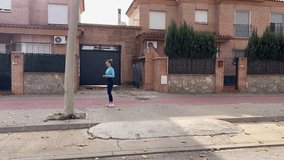 Adult woman jogging, stretching, and hydrating during outdoor fitness training in urban and sports environments - Powered by Shutterstock - Get 15% off with code: PIKWIZARD15