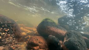 Whirlpool in a shallow, muddy stream, Estonia. - Powered by Shutterstock - Get 15% off with code: PIKWIZARD15