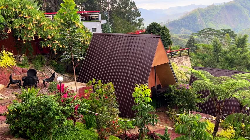 A-frame cabins surrounded by vibrant plants and mountain scenery—perfect for eco-resorts, travel content, and lifestyle promos.