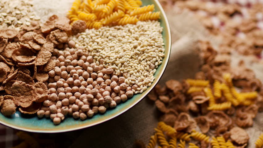 Carbohydrate-rich Food on Plate Rotating on Table